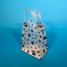 Load image into Gallery viewer, Paw print tote bag angle view