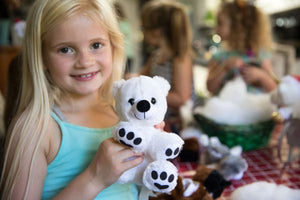 Girl with polar bear stuffy